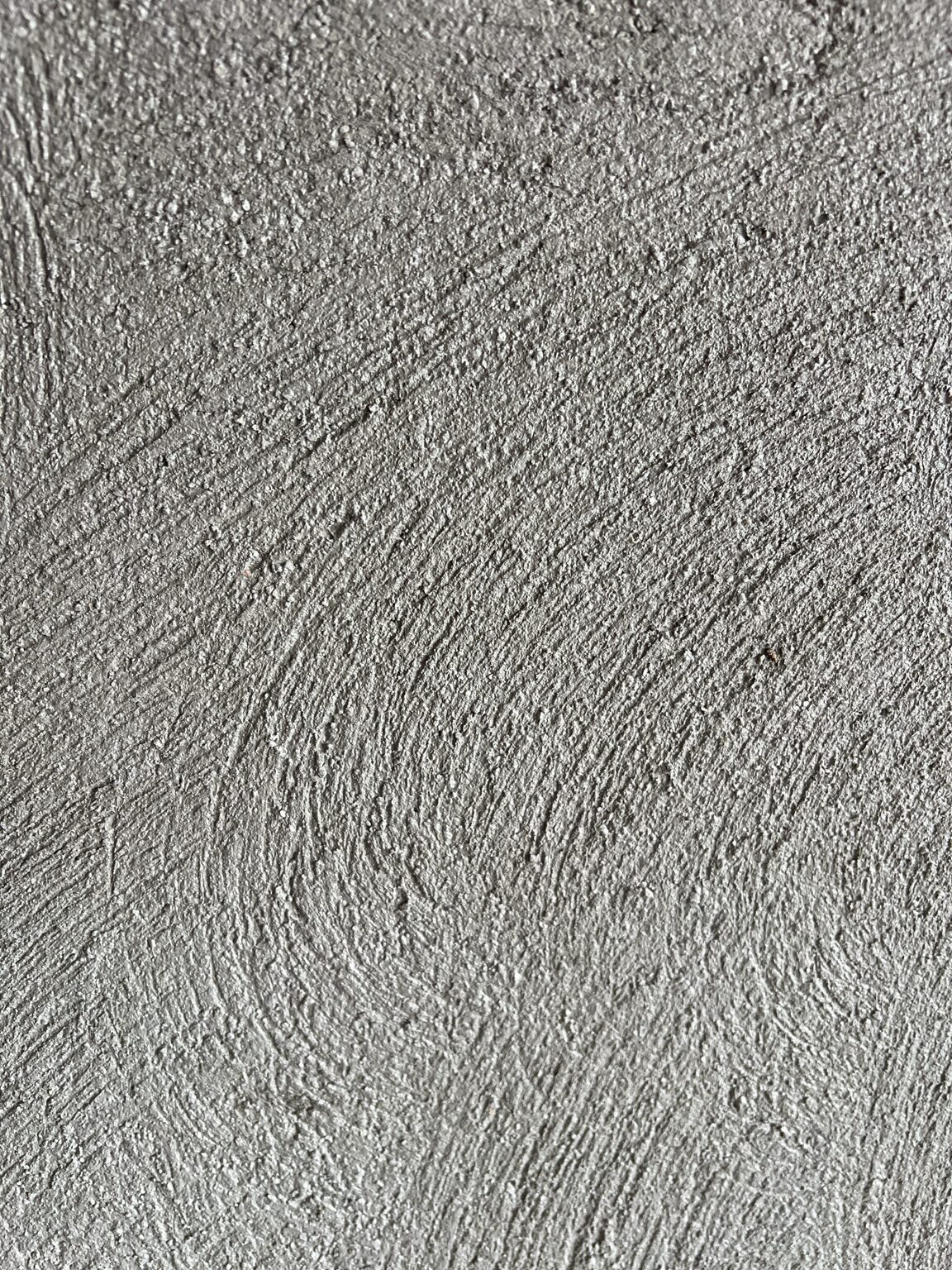 Close-up van de aangebrachte waterdichtingslaag op het metselwerk